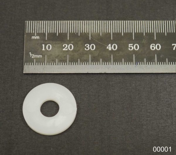 Plastic washer- outside of wheel spat