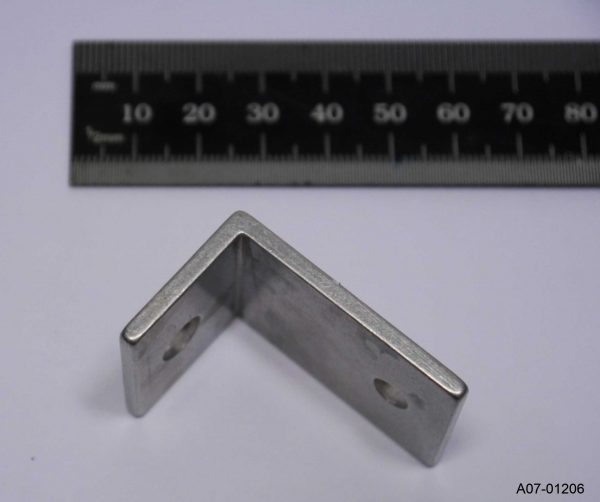 Upper rear fuselage angle bracket for composite to A frame.